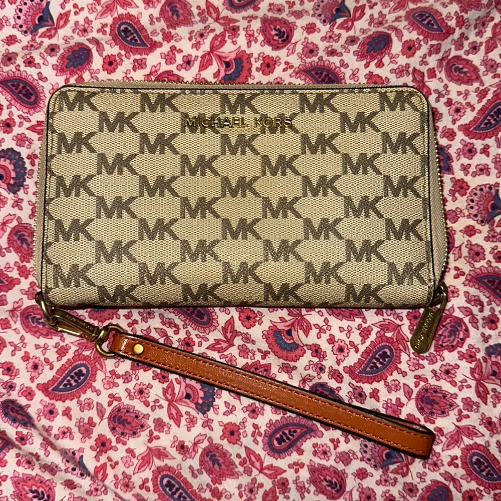 Authentic Michael Kors wallet with strap